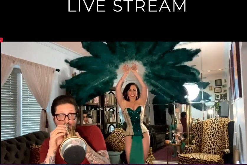 Brian Newman and his wife, Angie Pontani, are shown during the Mondays Dark Live Stream Teletho ...