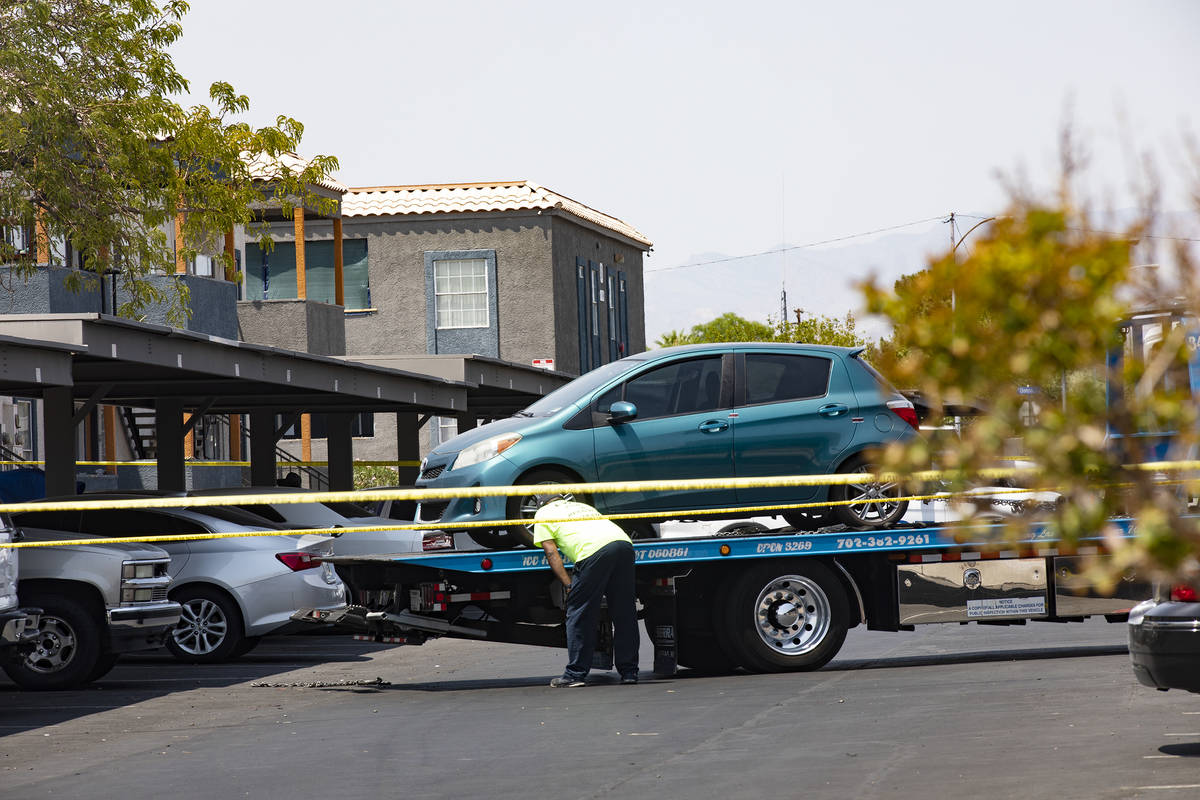 Police at the scene of a homicide on the 1000 block of East Carey Avenue in North Las Vegas Wed ...