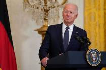 President Joe Biden listens during a news conference with German Chancellor Angela Merkel in th ...
