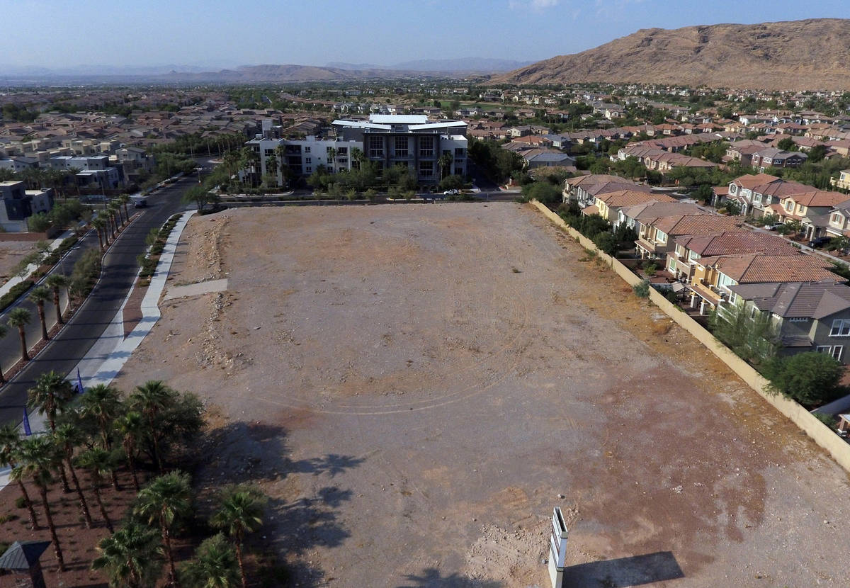 A vacant parcel of land that is slated to get a townhouse project called Thrive is shown, on Th ...