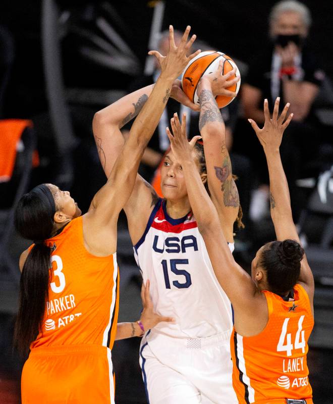 Team WNBA's Candace Parker (3) and Betnijah Laney (44) guard U.S. Women's National Team's Britt ...