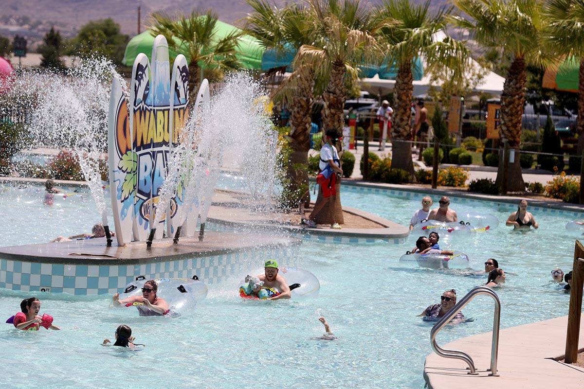 Boardwalk Bay, left, and the Cowabunga River at the reopening of Cowabunga Bay water park in He ...