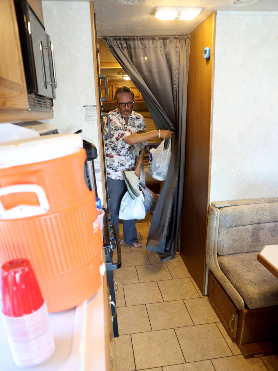 Jamil Ghuleh exits after a shower in an RV operated by Cup of Hope outreach ministry at Jaycee ...