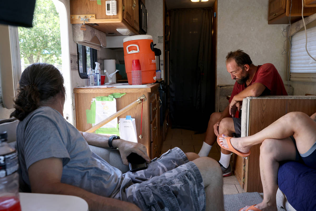 Eric Gutierrez, 39, waits for a shower in an RV operated by Cup of Hope outreach ministry at Ja ...