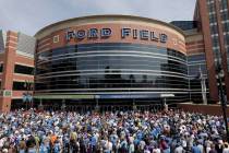Fans arrive to Ford Field before and NFL football game between the Detroit Lions and Minnesota ...