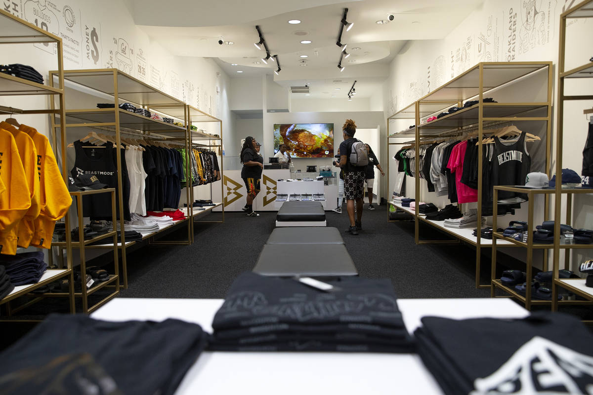 Employees ready Marshawn Lynch's store, Beast Mode, before its grand opening in The Shoppes at ...