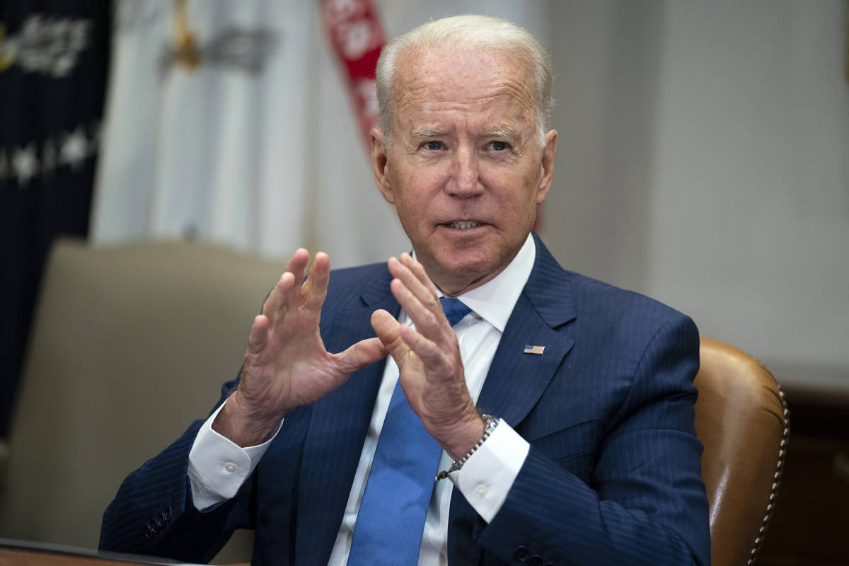 President Joe Biden speaks during a meeting on reducing gun violence, in the Roosevelt Room of ...