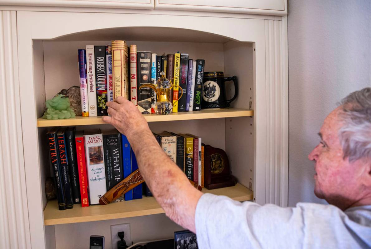 Byron Peterson, who has Wernicke's aphasia, a speech and comprehension disorder, points to book ...