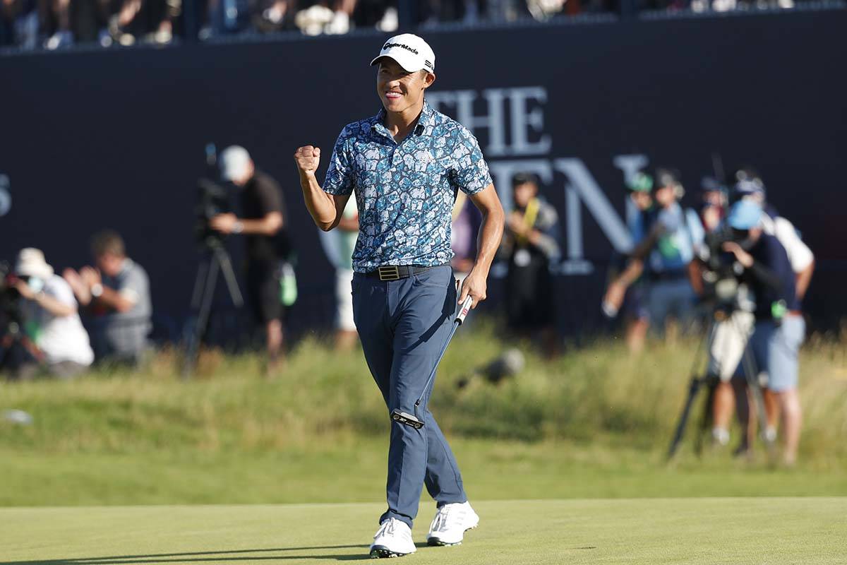 United States' Collin Morikawa celebrates on the 18th green after winning the British Open Golf ...