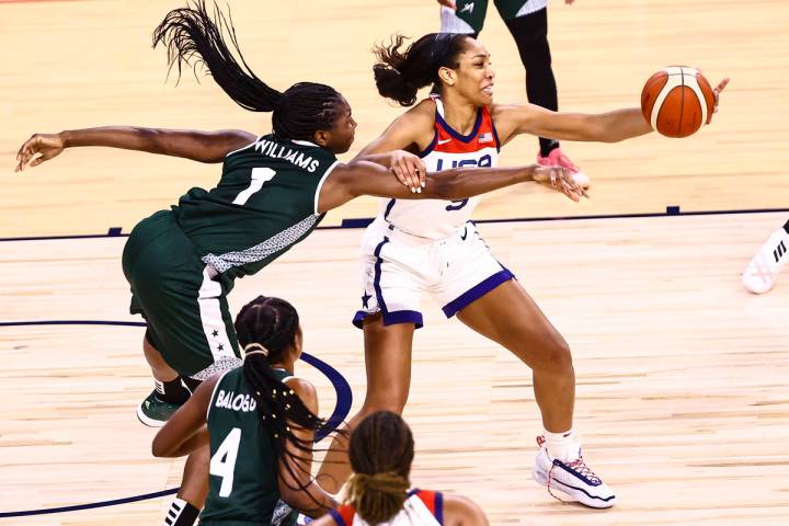 Nigeria forward/center Elizabeth Williams (1) battles for a loose ball against United States fo ...