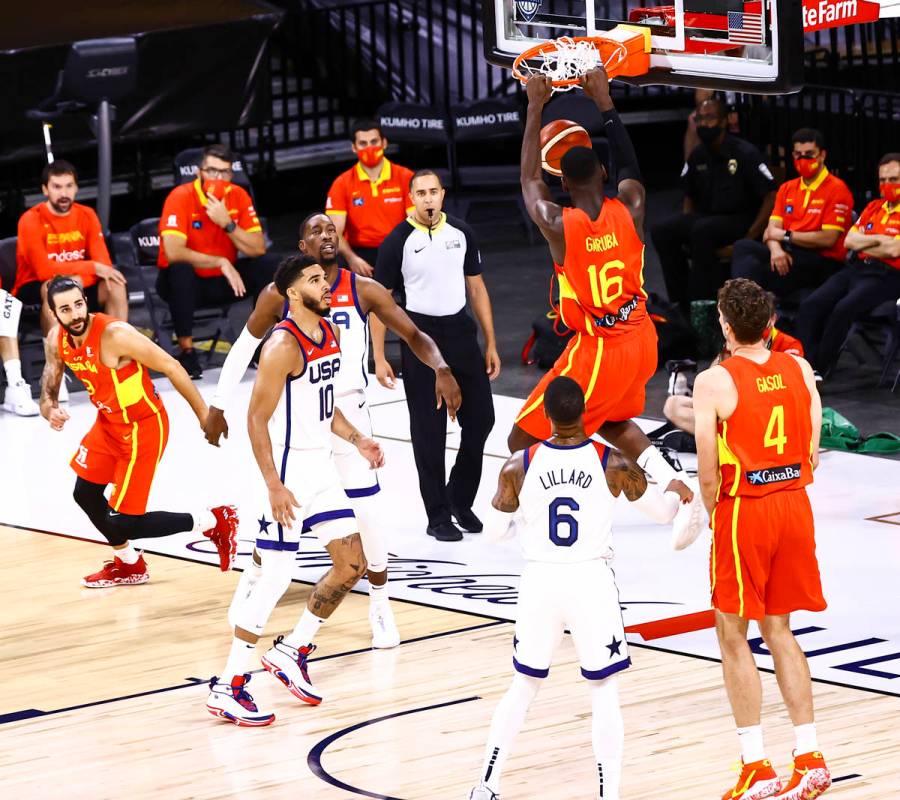 Spain power forward Usman Garuba (16) dunks the ball against the United States during the first ...