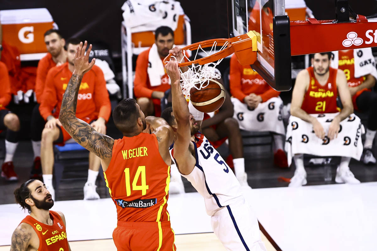 United States guard Zach Lavine (5) dunks the bal in front of Spain center Willy Hernangomez (1 ...