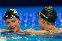 Katie Ledecky congratulates Katie Grimes after the women's 800 freestyle during wave 2 of the U ...