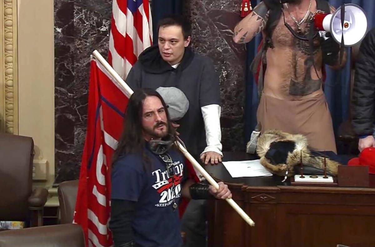 In this file image from U.S. Capitol Police video, Paul Allard Hodgkins, 38, of Tampa, Fla., fr ...