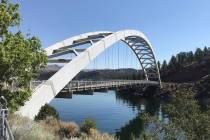 The Cart Creek Bridge spans a lovely side canyon of Flaming Gorge near Dutch John, Utah. (Debor ...