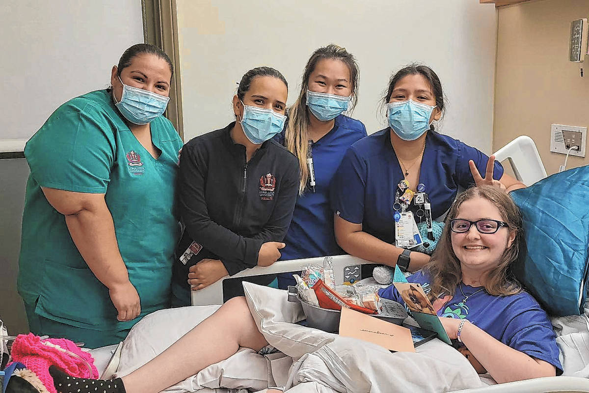 Emma Burkey with hospital staff at medical facilities at Loma Linda University. (Burkey Family)