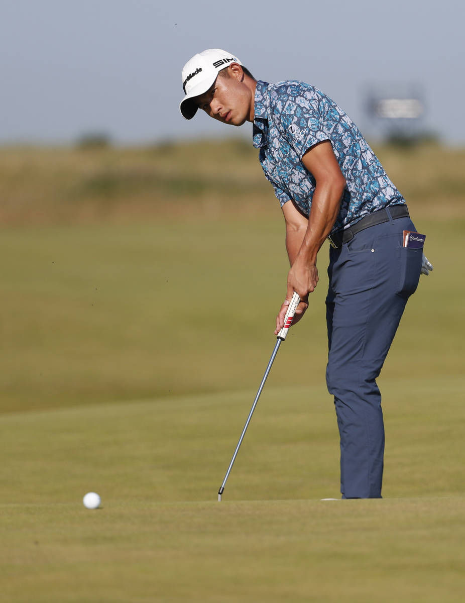 United States' Collin Morikawa makes a birdie putt on the 14th hole uring the final round of th ...