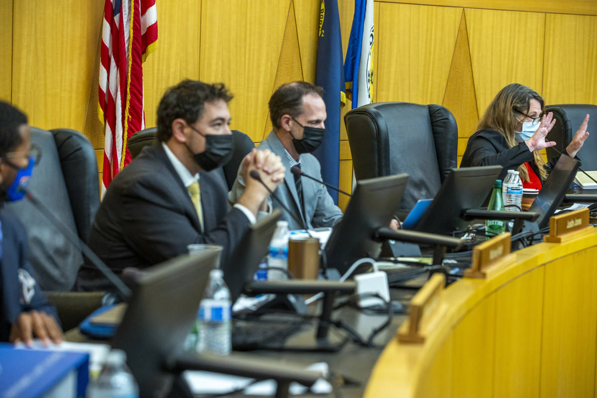 Clark County Commission Chairman Marilyn Kirkpatrick, right, instructs people during public com ...