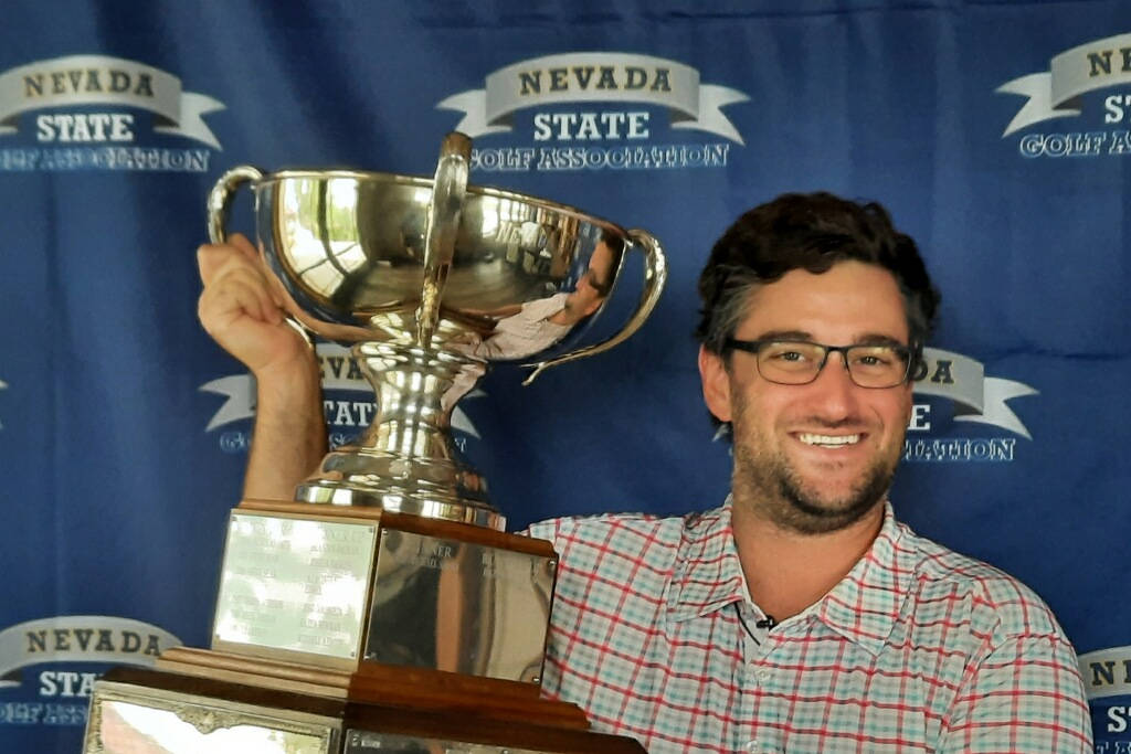 Josh Goldstein shows off the trophy after winning the Nevada State Amateur Championship at Red ...