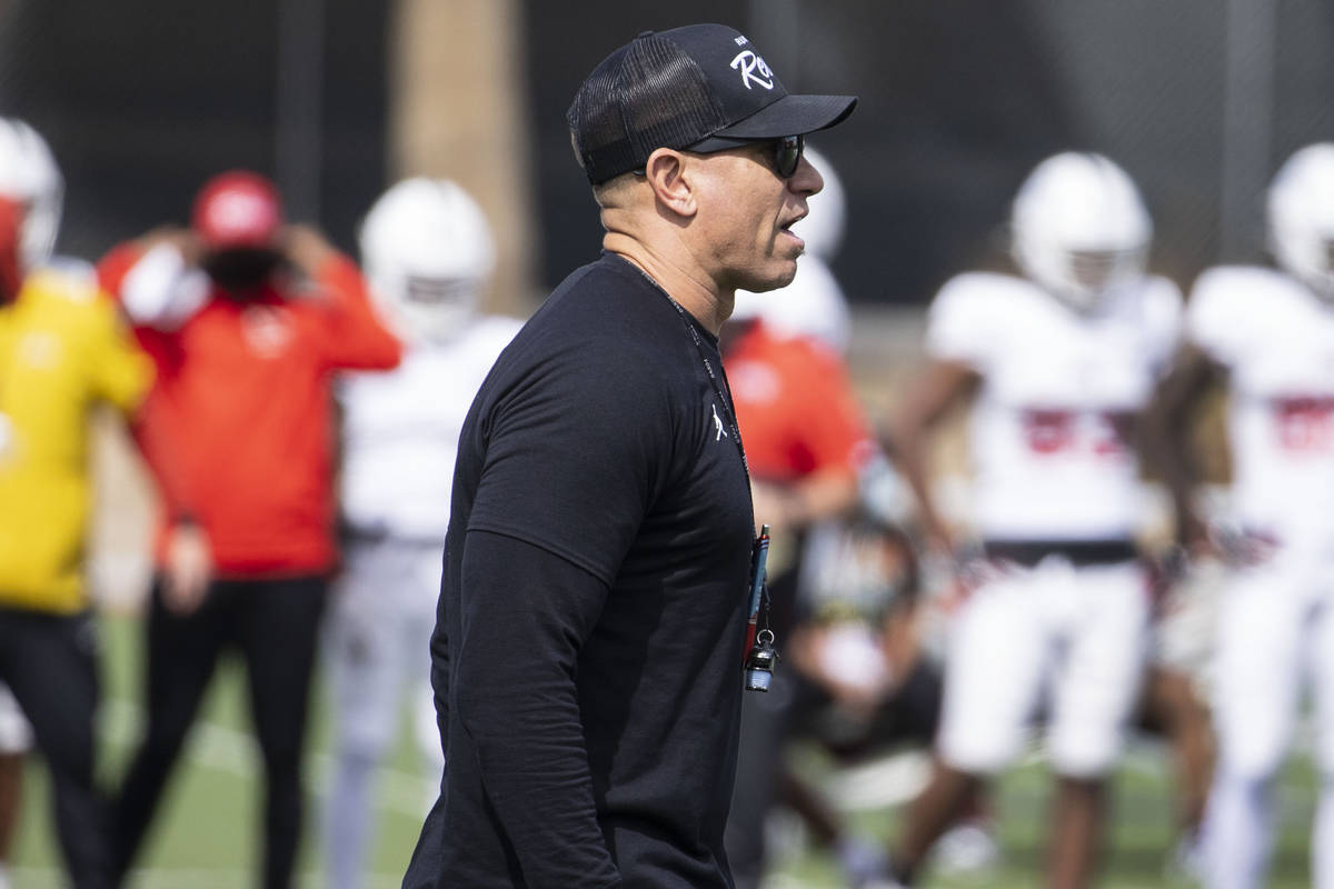 UNLV men's football head coach Marcus Arroyo watches his players during teamÕs practice on ...