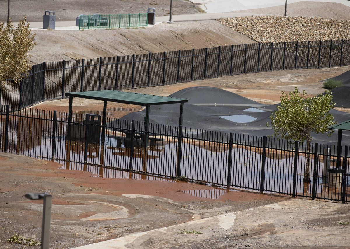 A playground at Arroyo Grande Sports Complex is surrounded by flood water, on Friday, July 23, ...