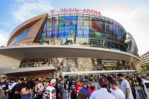 Fans wait to enter T-Mobile Arena before the start of Game 7 of an NHL Stanley Cup first-round ...