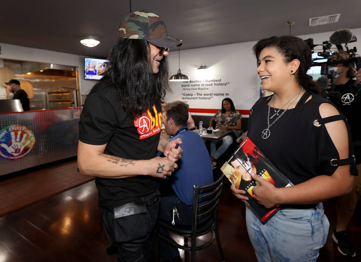 Criss Angel greets Patricia "Z" Lucas at his new restaurant, CABLP, in Overton during the grand ...