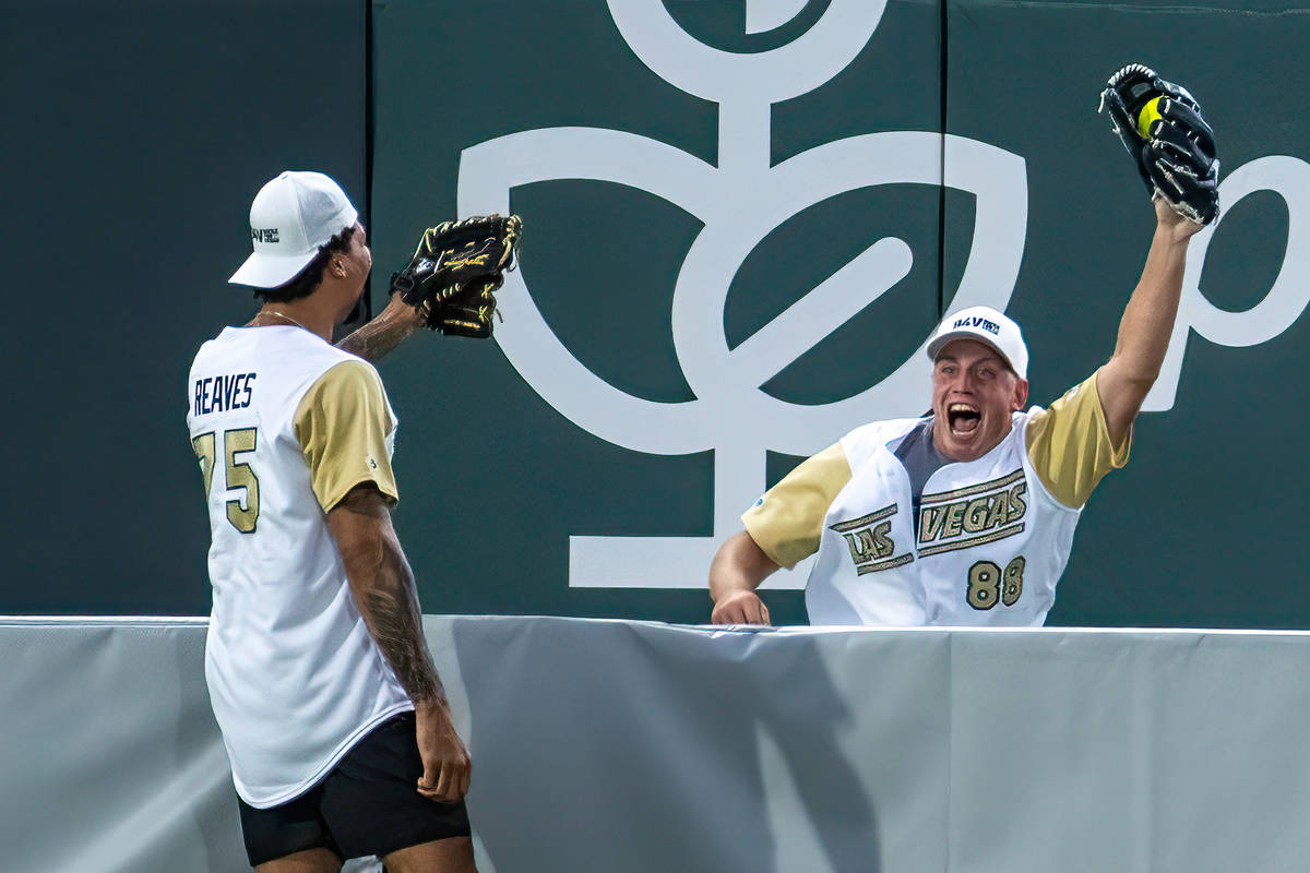 Vegas Golden Knights Ryan Reaves (75) and Nate Schmidt (88), playing with his former teammates, ...