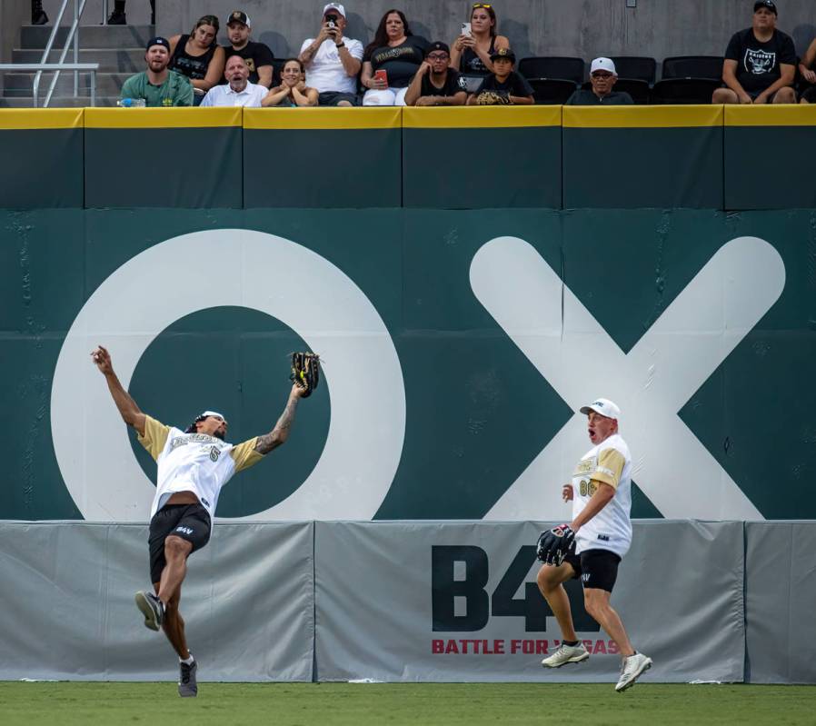 Vegas Golden Knights Ryan Reaves (75) goes back for a great catch as Nate Schmidt (88), playing ...