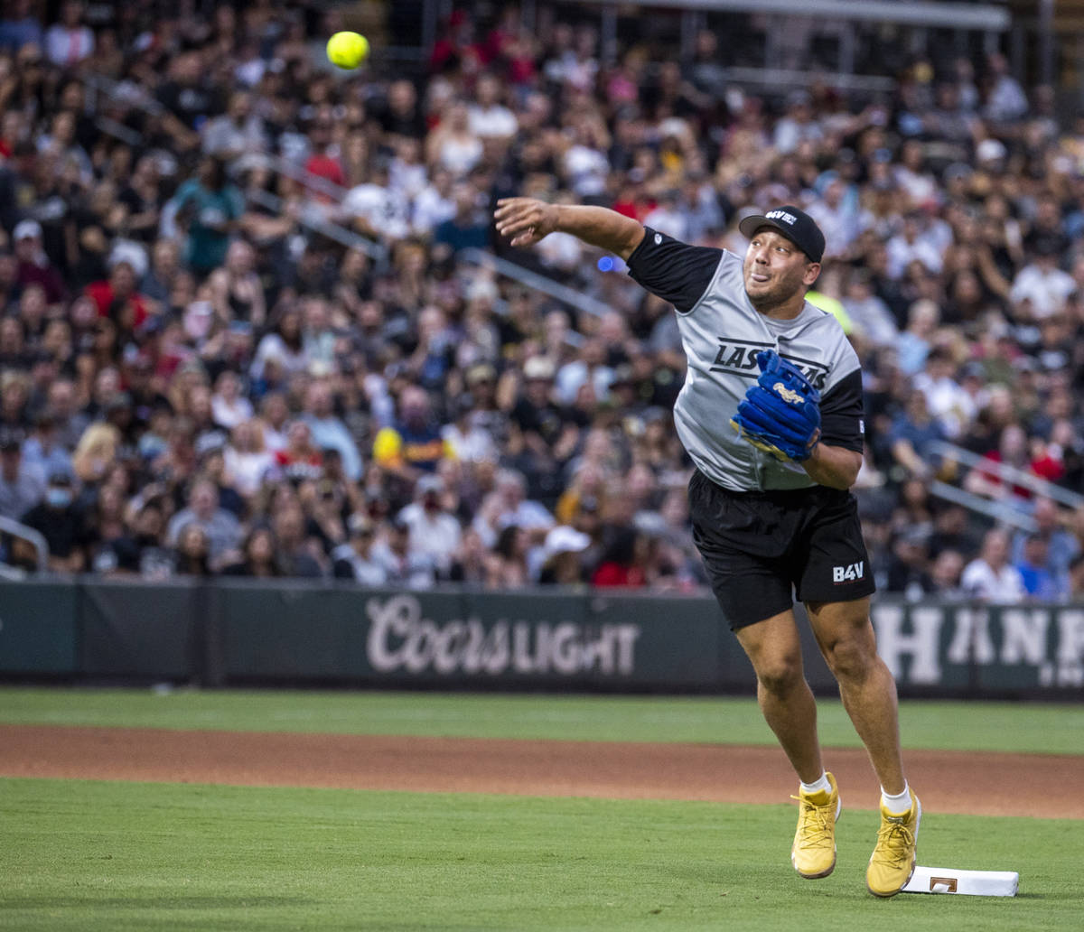 Las Vegas Raiders Alec Ingold (45) throws the ball during a charity softball game involving pla ...