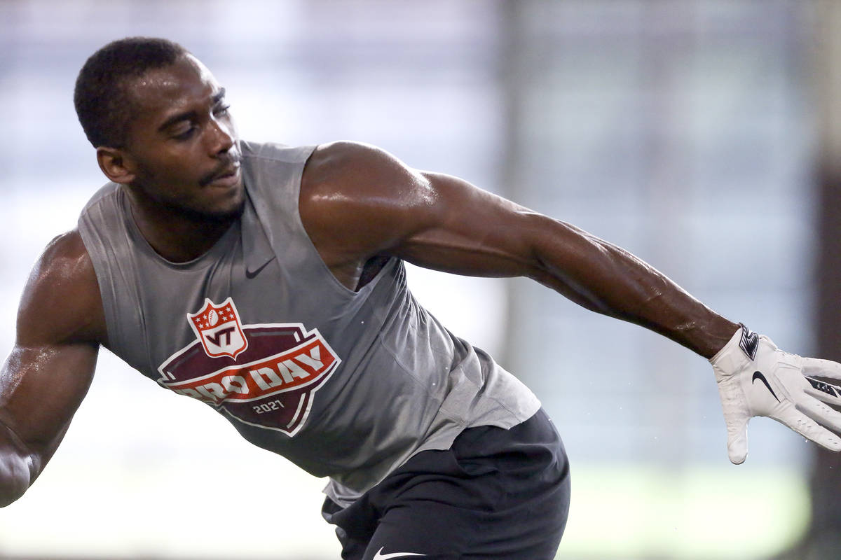 Divine Deablo runs during Virginia Tech pro day, attended by NFL football scouts, in Blacksburg ...