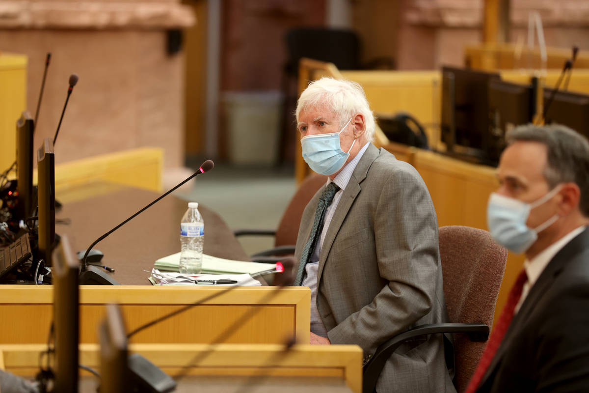 Ombudsman Terrence Jackson asks a question of Metropolitan Police Department Detective Jason Le ...