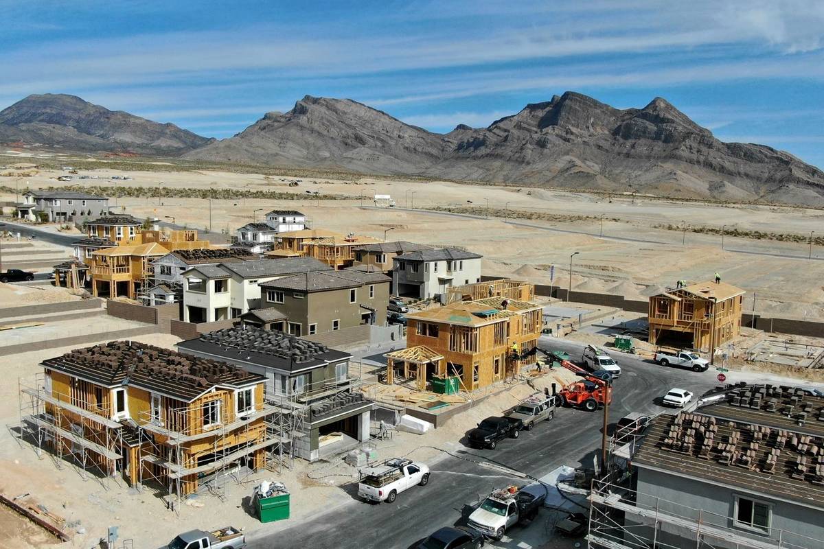 An aerial view of homes under construction in Cascades, a housing development near Far Hills Av ...