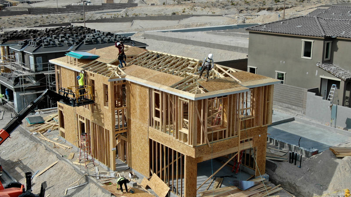 An aerial view of homes under construction in Cascades, a housing development near Far Hills Av ...