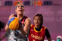 Kelsey Plum, of the United States, shoots during a women's 3-on-3 basketball game against China ...
