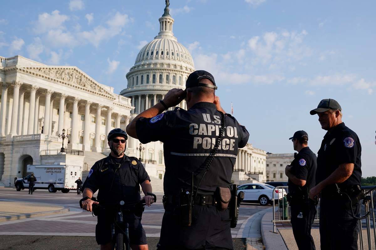 The U.S. Capitol is seen in Washington, early Tuesday, July 27, 2021, as U.S. Capitol Police wa ...