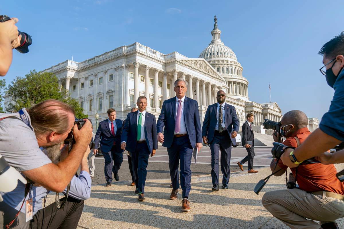 House Minority Leader Kevin McCarthy of Calif., accompanied by Rep. Kelly Armstrong, R-N.D., se ...