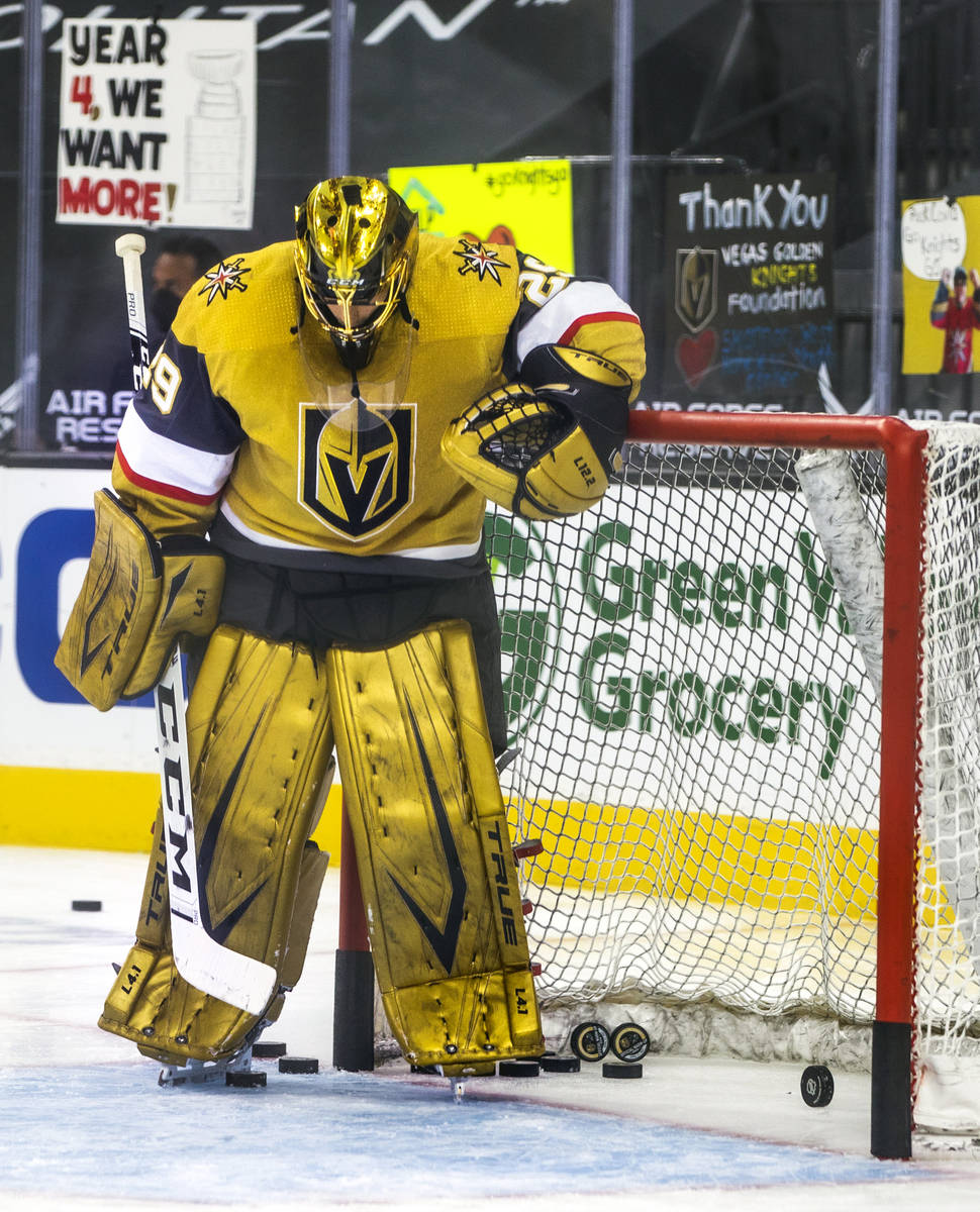Golden Knights goaltender Marc-Andre Fleury (29) rests during the first period of an NHL game a ...
