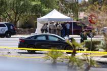 A fatal motorcycle crash is investigated Wednesday, July 28, 2021, near South Rainbow Boulevard ...