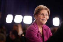 Sen. Elizabeth Warren, D-Mass., talks in the spin room after a Democratic presidential primary ...