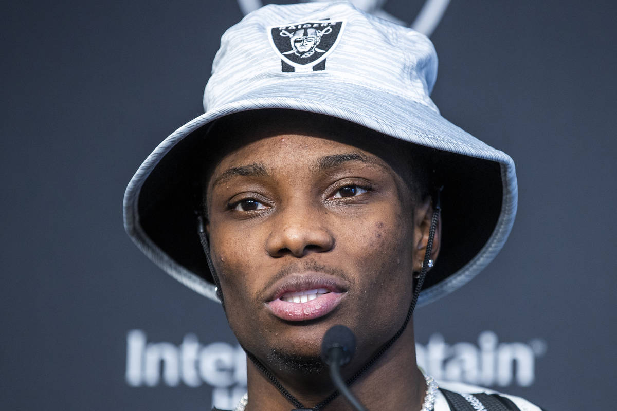 Raiders wide receiver Henry Ruggs speaks during a press conference following the first practice ...