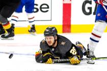 Golden Knights center Mattias Janmark (26) looks to a puck that just gets away on a drive to th ...
