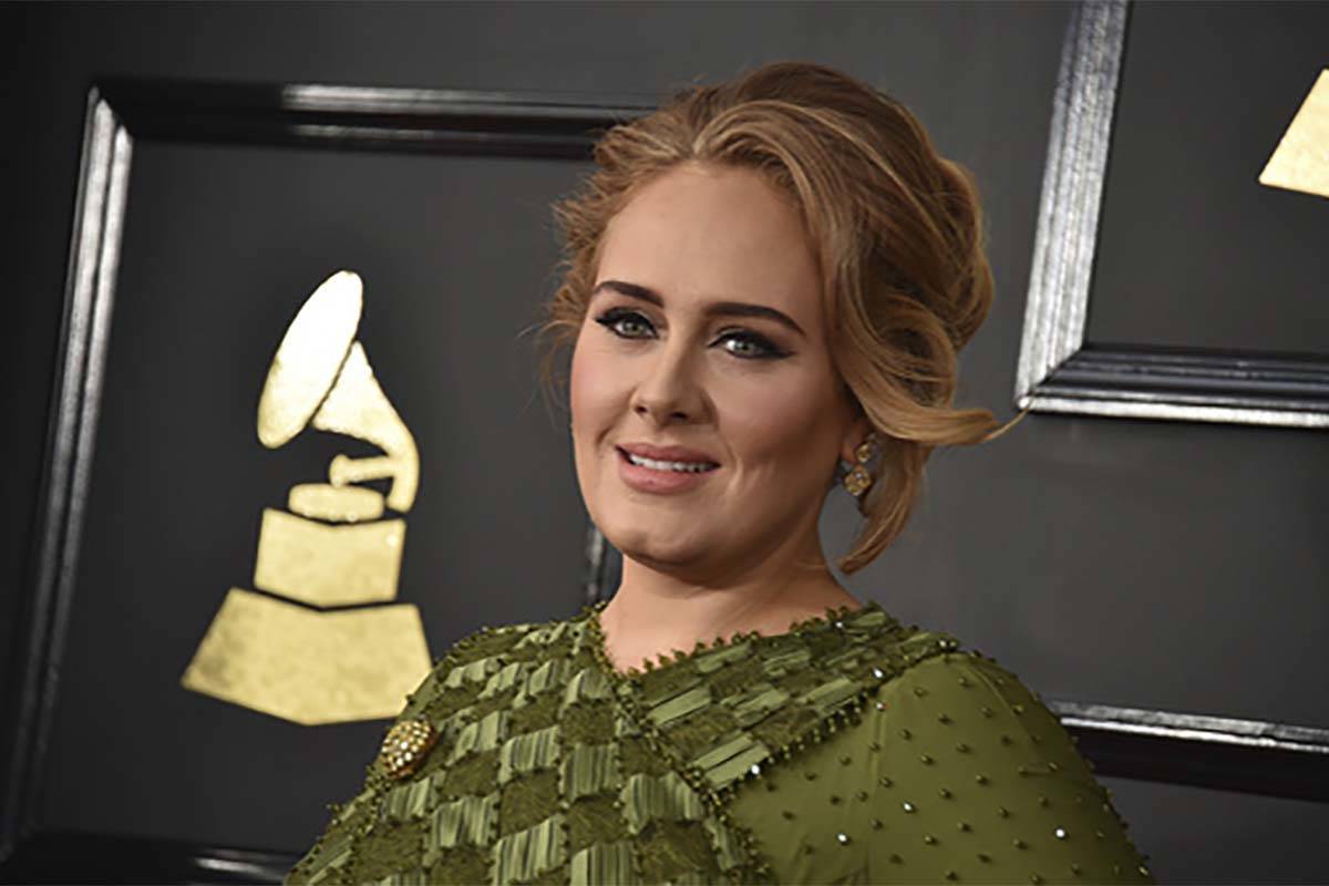 In this Feb. 12, 2017, file photo, Adele arrives at the 59th annual Grammy Awards at the Staple ...