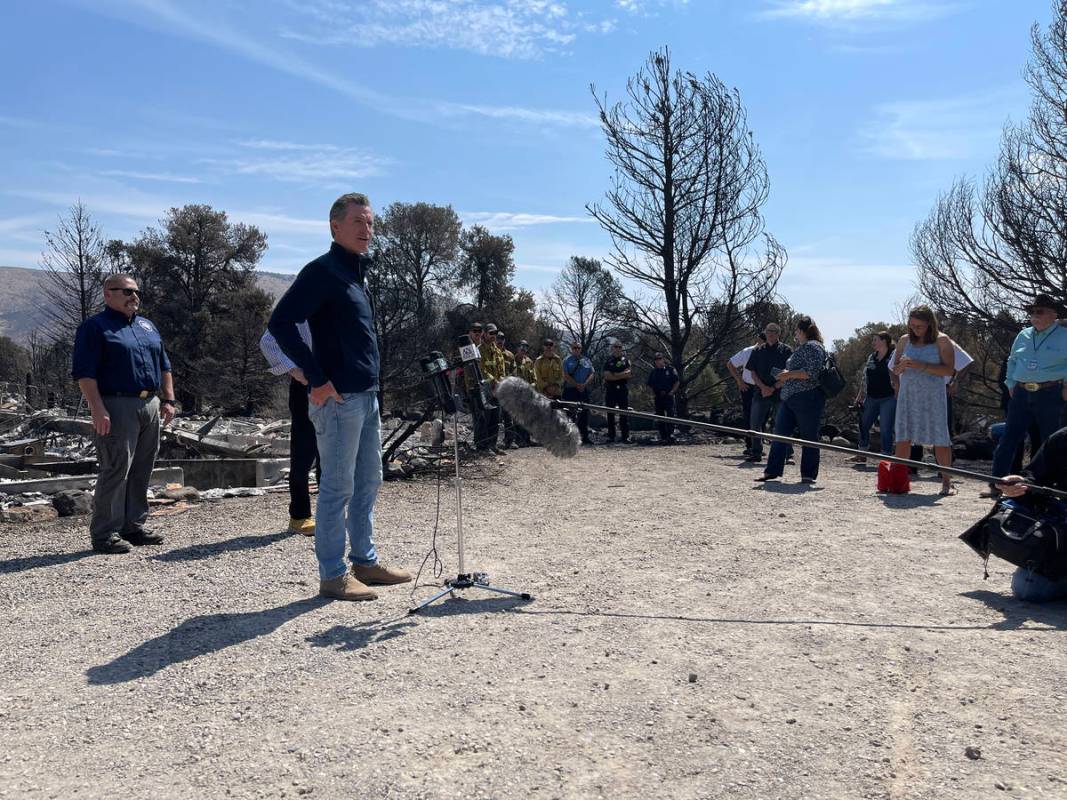 Gov. Gavin Newsom of California speaks to reporters onthe Tamarack Fire. July 28, 2021. (Bill D ...