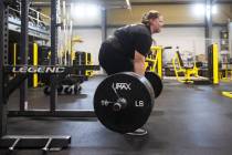 Milan Bunker, 19, works out at Protogym on Wednesday, July 28, 2021, in Henderson. Bunker recen ...