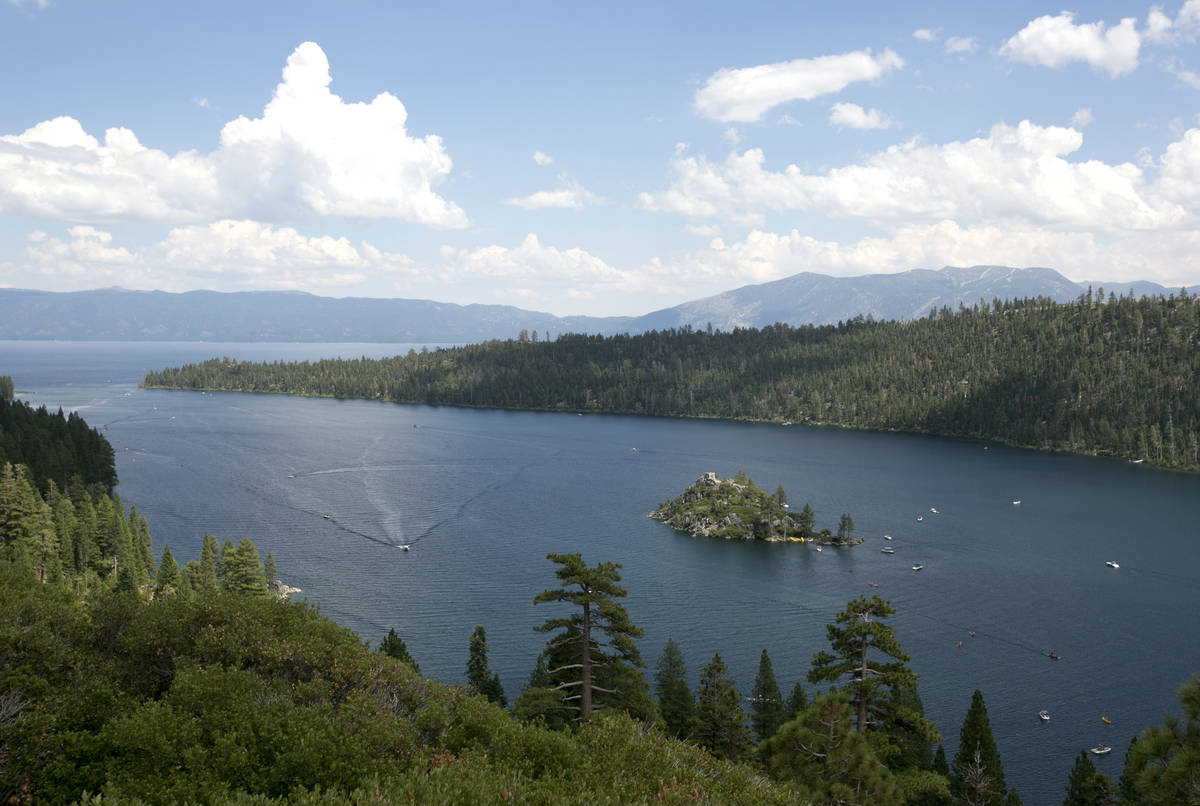 Boats ply the waters of Emerald Bay, near South Lake Tahoe, Calif., in 2017. (AP Photo/Rich Ped ...