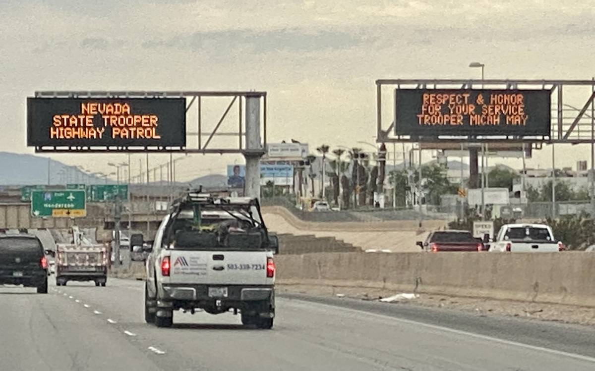 The sign for Nevada Highway Patrol troopeMicah May is seen Interstate 15 southbound in Las Vega ...