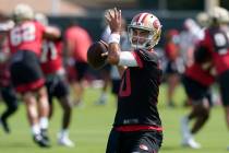San Francisco 49ers quarterback Jimmy Garoppolo throws a pass at NFL football training camp in ...