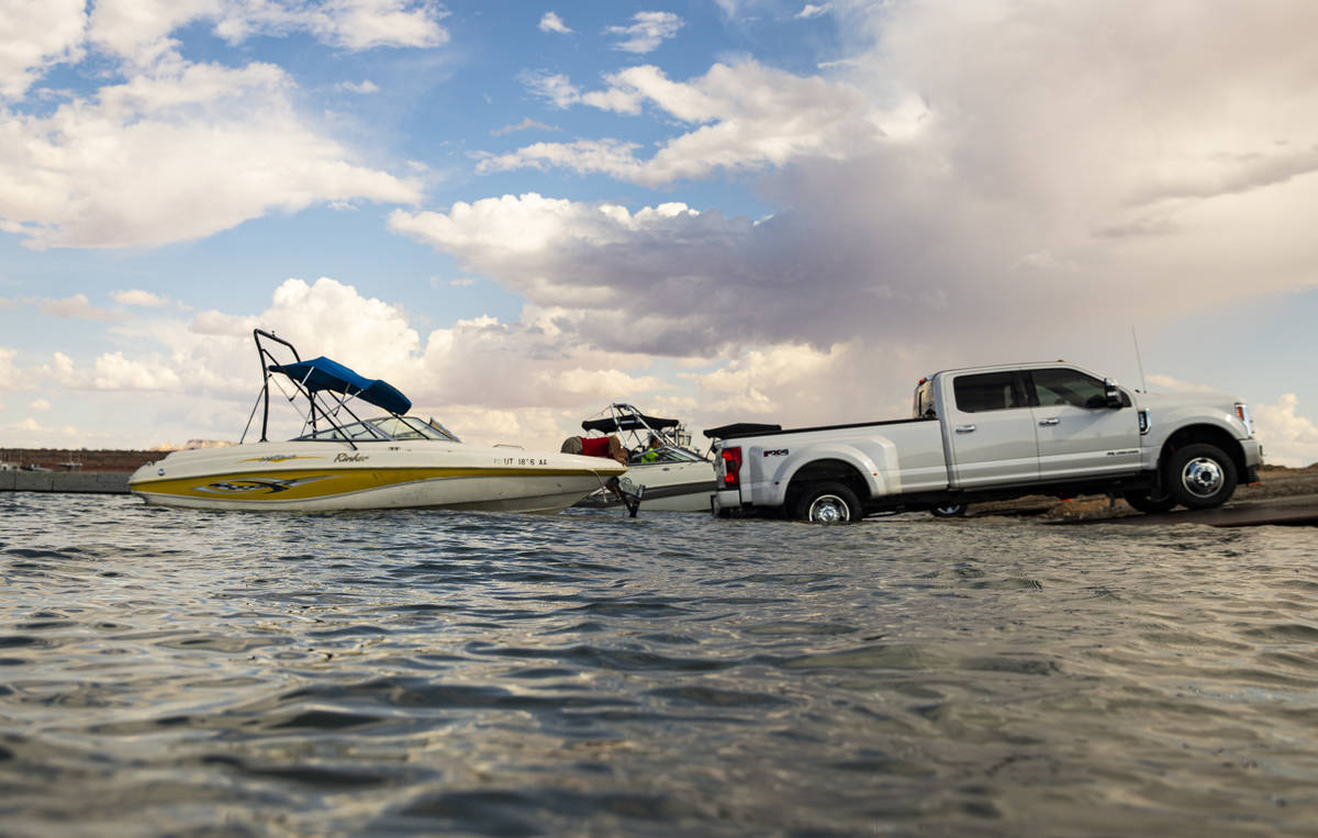 Randy Wendt, of Big Water, Utah, prepares to take his boat out of the water at the Wahweap main ...