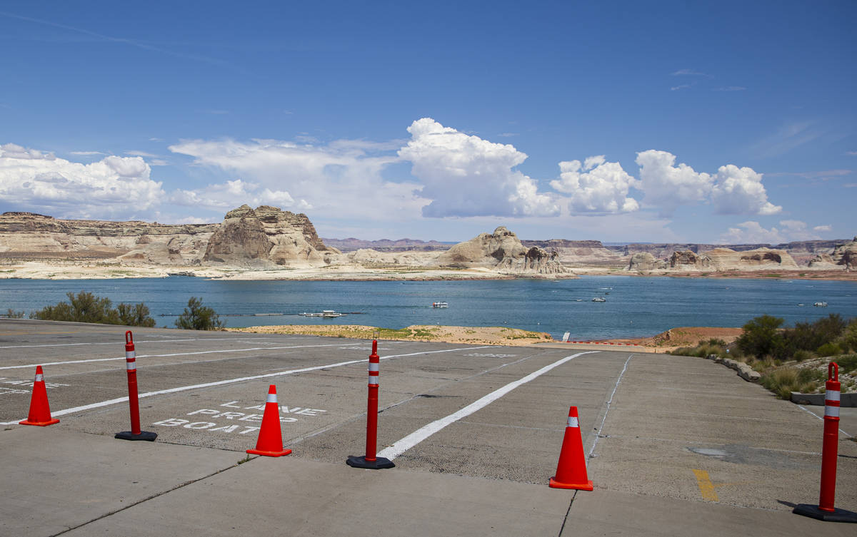 The blocked-off entrance to the Stateline boat launch ramp is seen at Lake Powell in the Glen C ...
